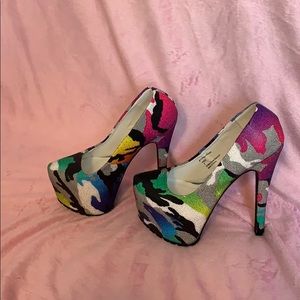Pair of camouflage print, platform pumps.